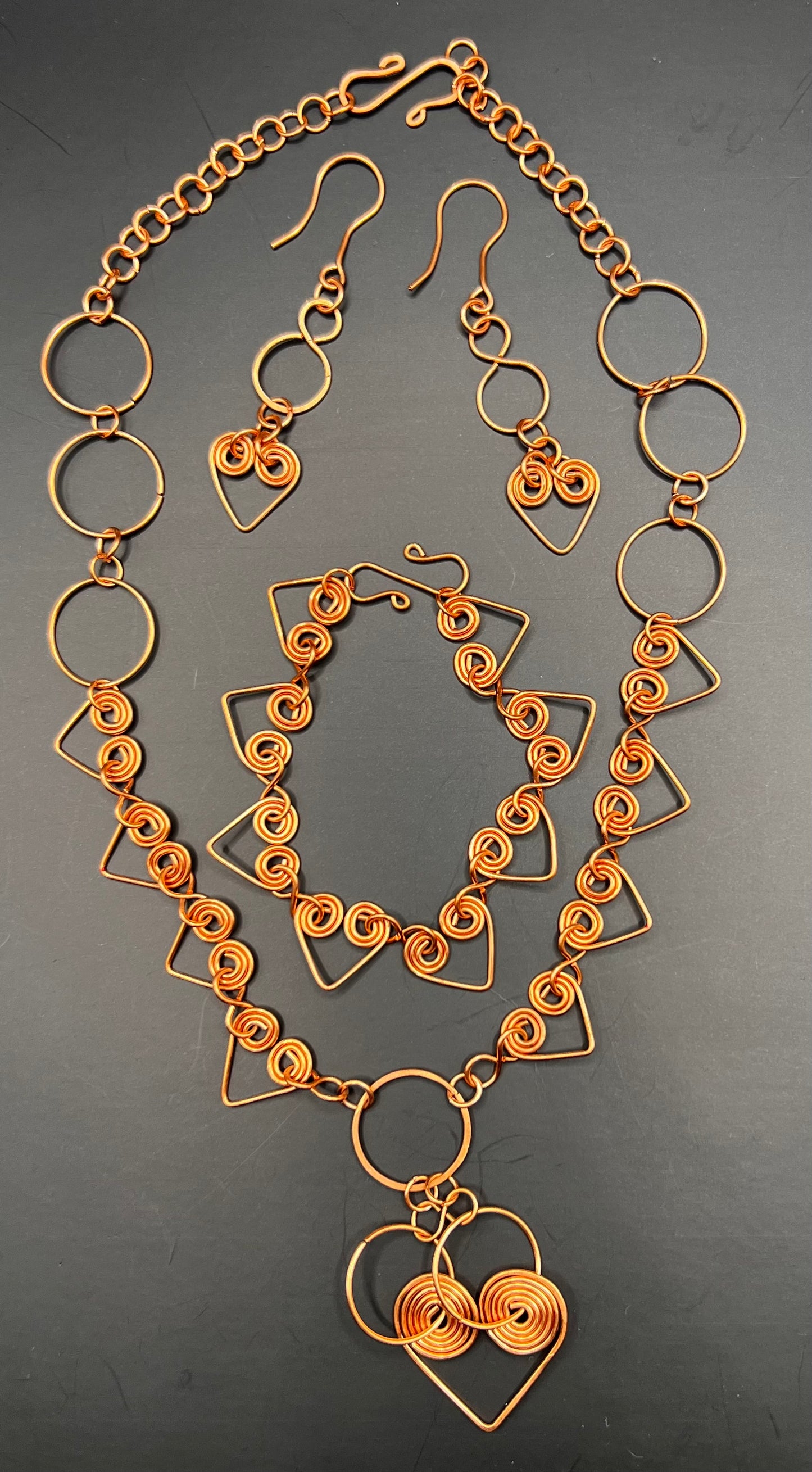 Copper handmade coiled hearts necklace, bracelet and earrings