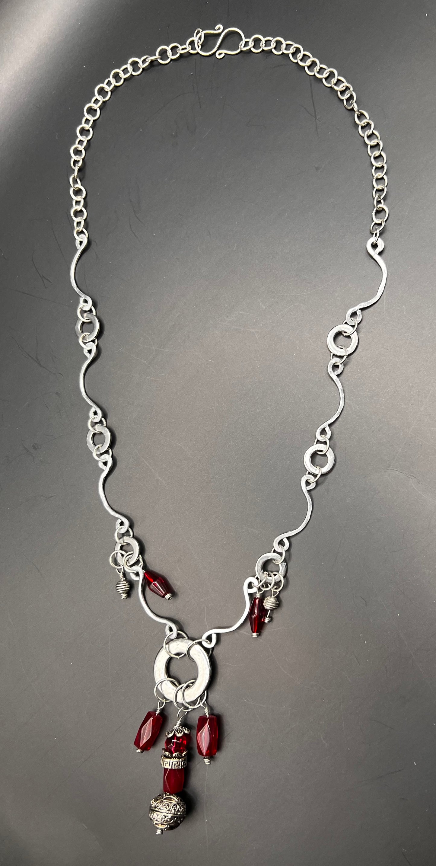 Silver arches & hoops with red and silver beads