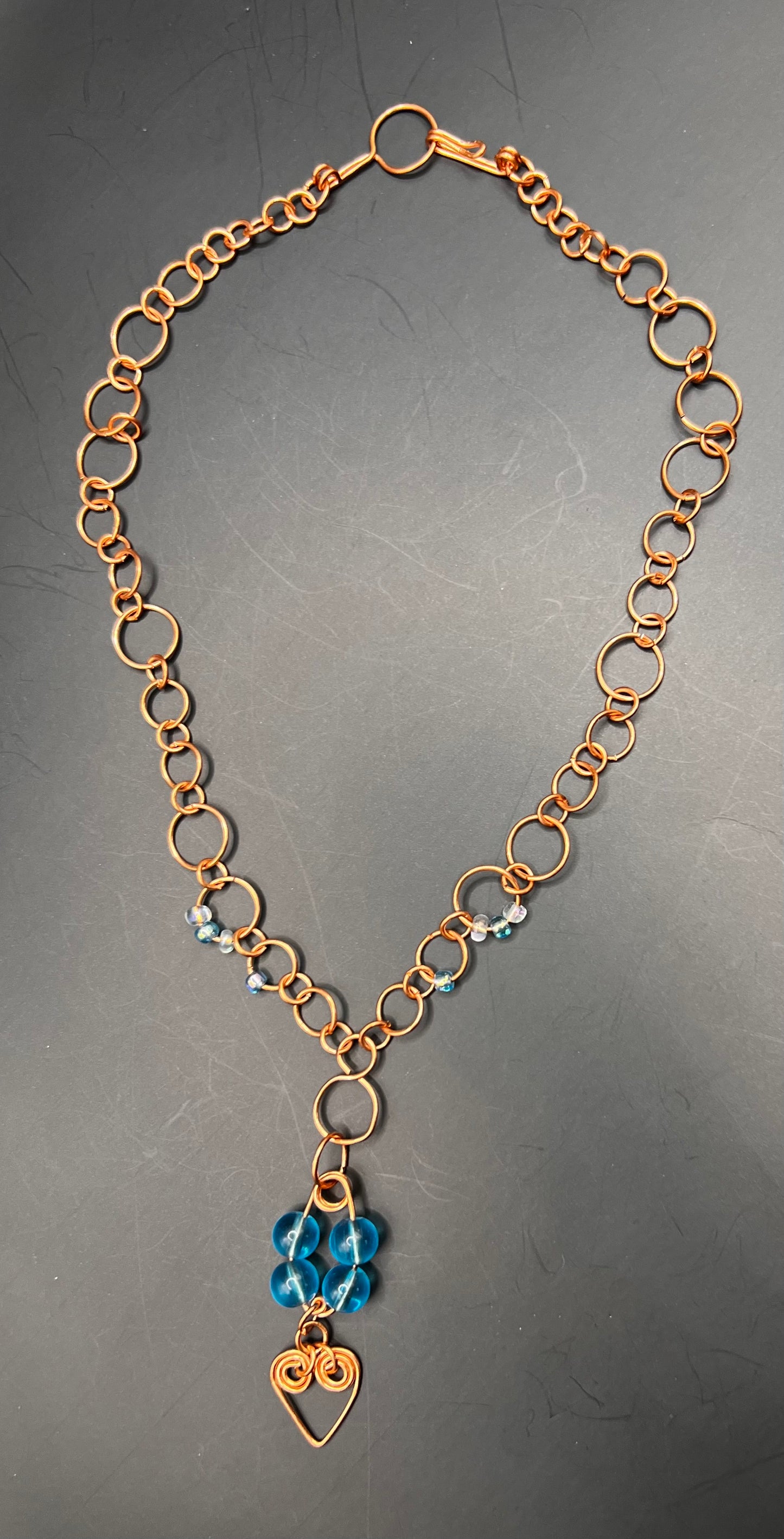 Copper hoops necklace w/ teal beads and a heart