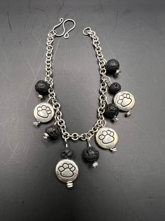 Silver bracelet with black beads & silver paw print charms