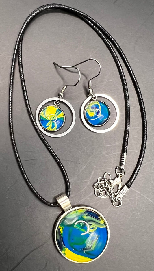 Blue & yellow round & outline circle silver cabochon W/ black chord