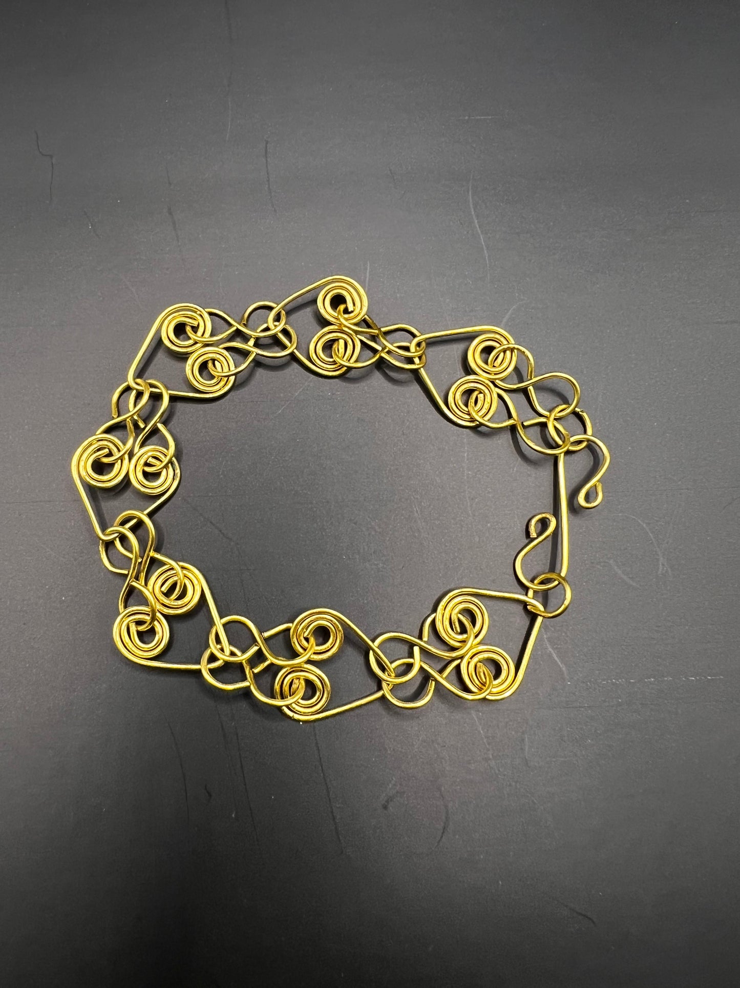 Gold Coiled Heart Bracelet with Infinity Links