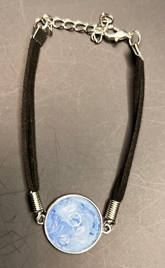Blue & white round silver cabochon with black chord bracelet