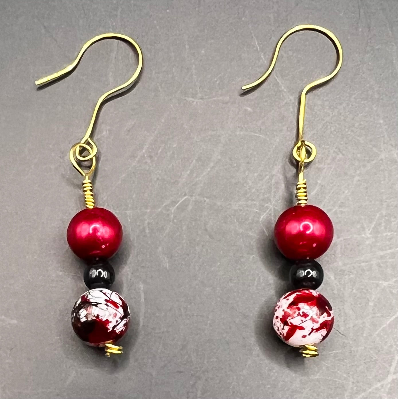 Gold Dangle Earrings with Red, Black & Multicolored red, black and white beads