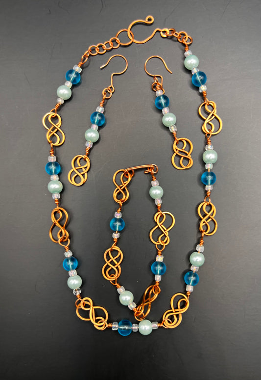 Copper and Teal infinity necklace, bracelet and earrings