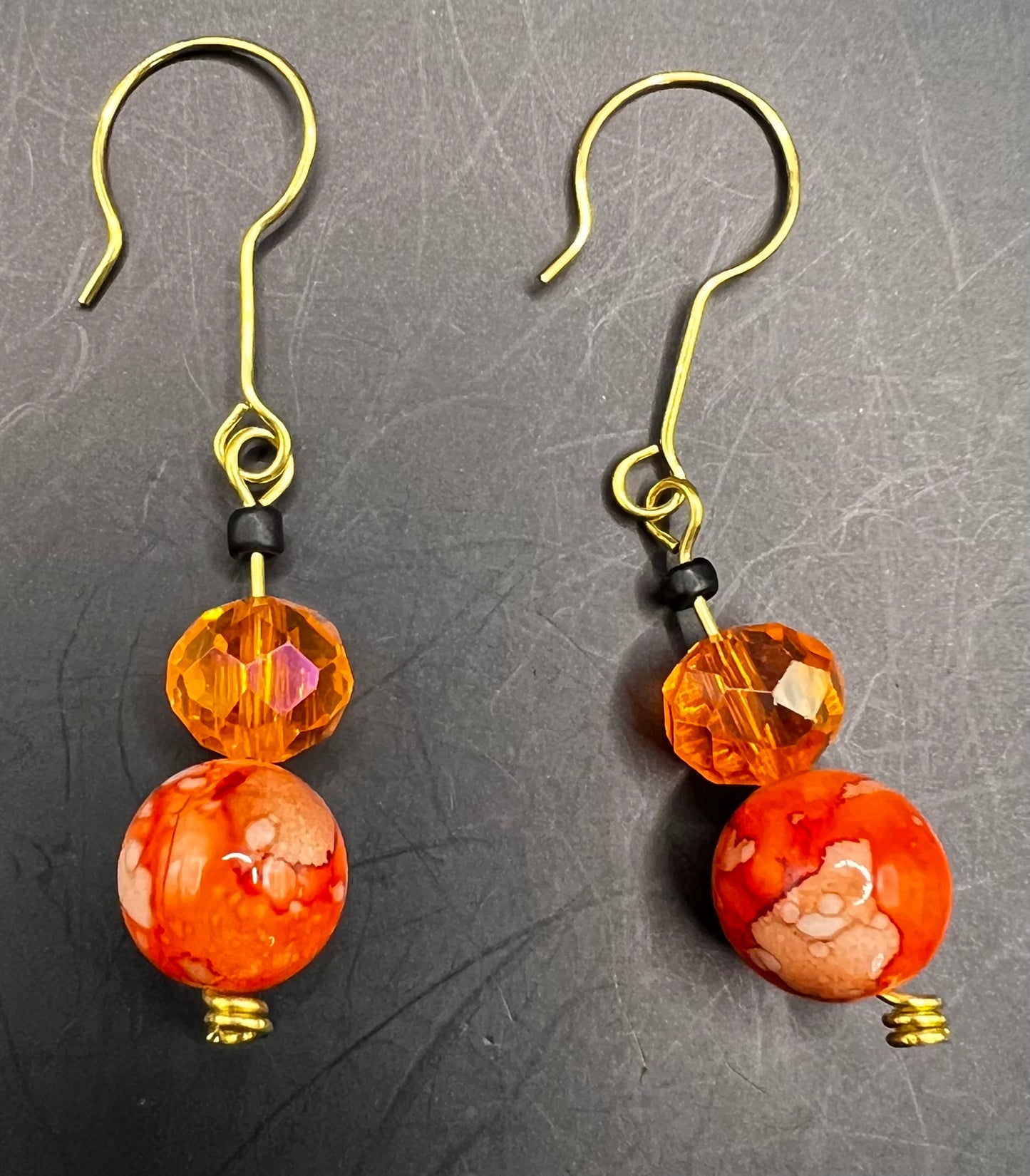 Gold Dangle Earrings with Orange and Black Beads