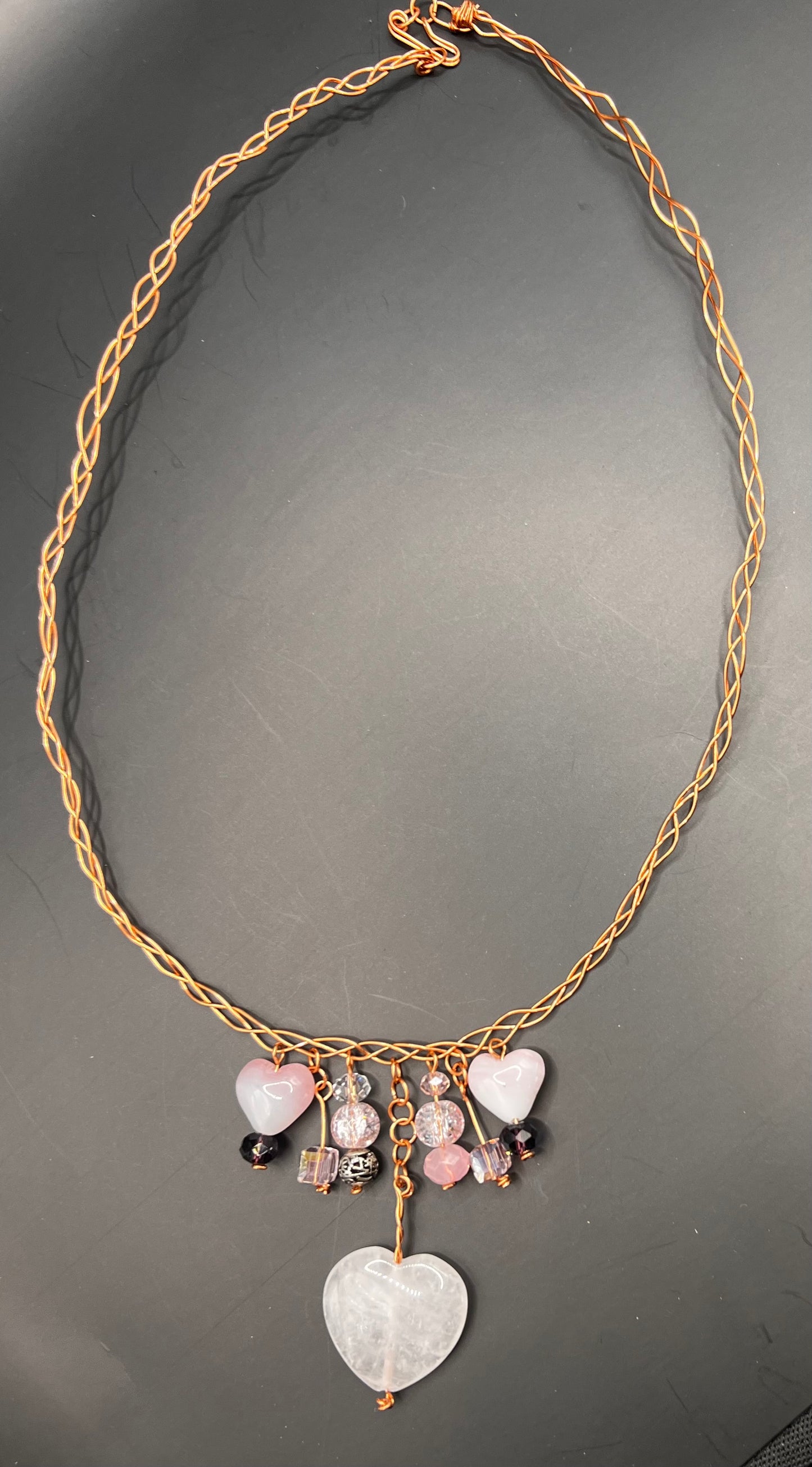 Twisted Copper Necklace with pink hearts and purple, silver and square beads