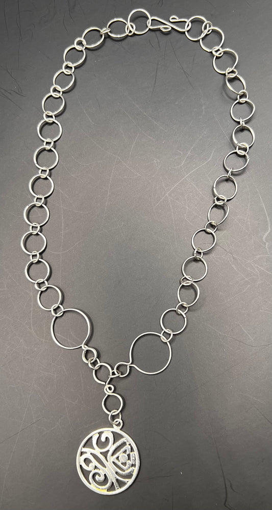 Silver multi-sized hoops necklace w/ silver pendant