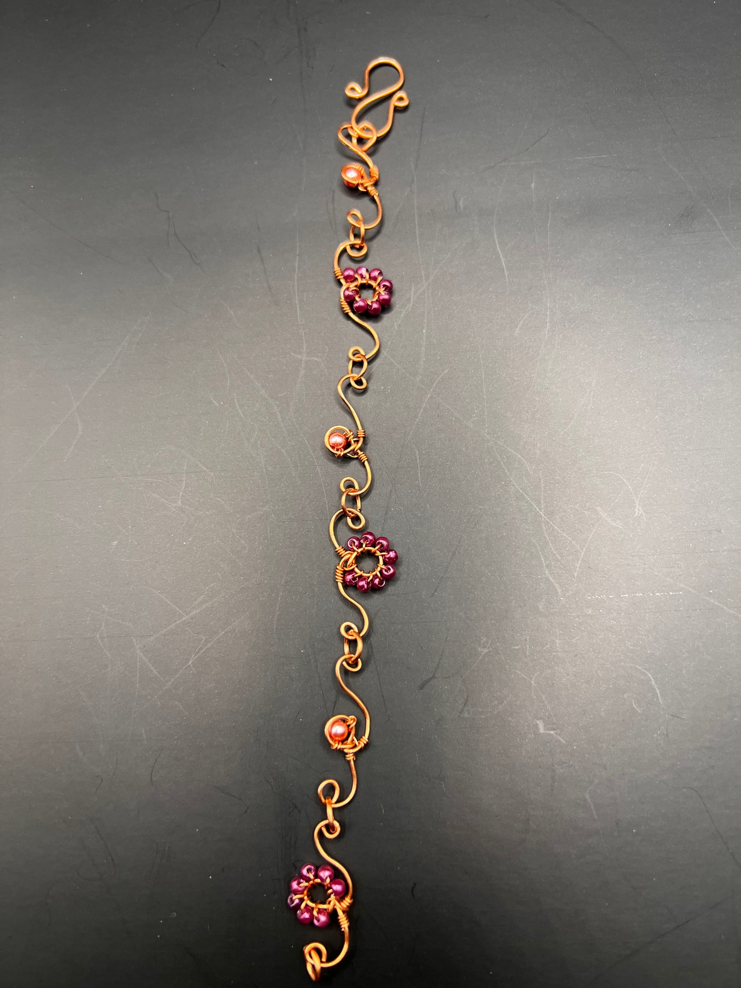 Copper bracelet with delicate designs & beads