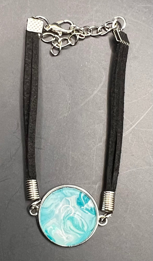 Teal & white round silver cabochon with black chord bracelet